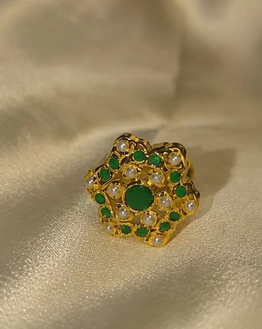 Silver and emberald floral ring